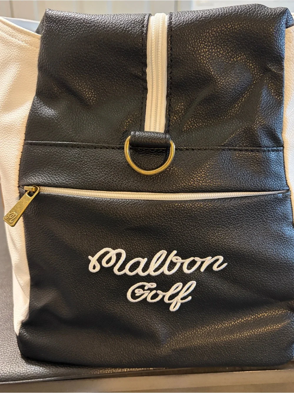 Malbon Duffel Bag Black, White, Brown.